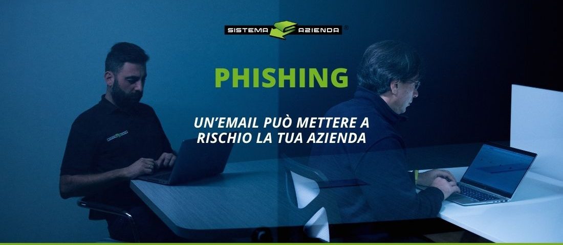 Due uomini che lavorano al computer con testo che avverte dei rischi del phishing via email per le aziende